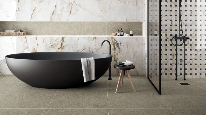 Bathroom with contrasting marble tiles on walls and floors